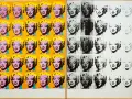 Marilyn Monroe en série, dans la technique d'Andy Warhol. Les portraits colorés contrastent avec les versions en noir et blanc, certaines estompées.