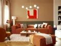 Salon cosy avec canapé orange, fauteuil velours et un tableau couleur chaude.
