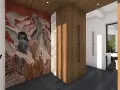 Une oeuvre connue ornée d'une silhouette féminine se détache sur un mur rouge, dans un espace moderne avec des placards en bois.