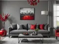 Un salon moderne aux murs gris, avec un tableau rouge noir gris de New York, un canapé gris, des coussins rouges et un fauteuil rouge.