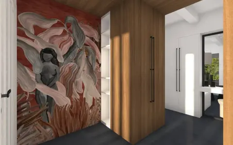 Une oeuvre connue ornée d'une silhouette féminine se détache sur un mur rouge, dans un espace moderne avec des placards en bois.