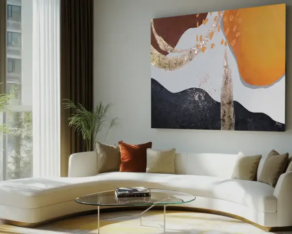 Salon moderne avec un canapé blanc incurvé, une table basse en verre et une œuvre abstraite aux couleurs vives, signée d'un artiste célèbre.