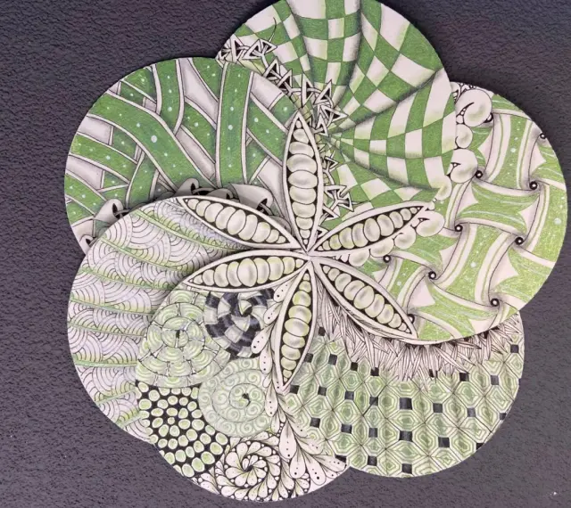 Fleur de zentangle aux motifs complexes, évoquant l'origine de cette technique artistique.