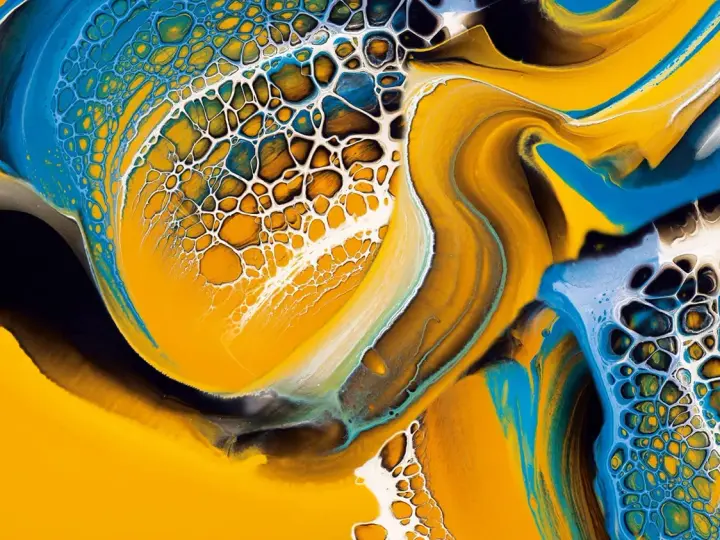 Vibrant yellow, blue, and white paint swirls create a mesmerizing cellular pattern, a testament to the ultimate pouring technique.